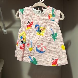 Dress includes hat and underwear